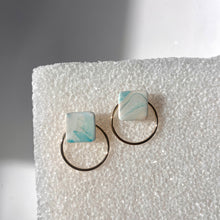 stud with circle backing