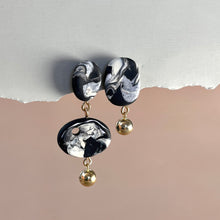 asymmetric with gold ball
